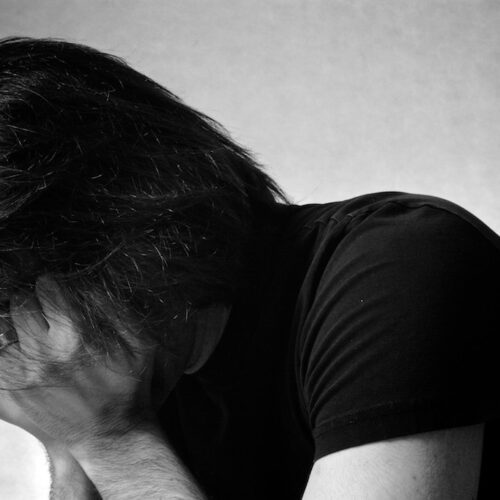 Man struggling to sleep at night