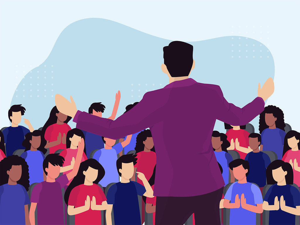 An animated Illustration art style showing a confident man speaking to a cheering audience, visually representing what are communication skills in action.