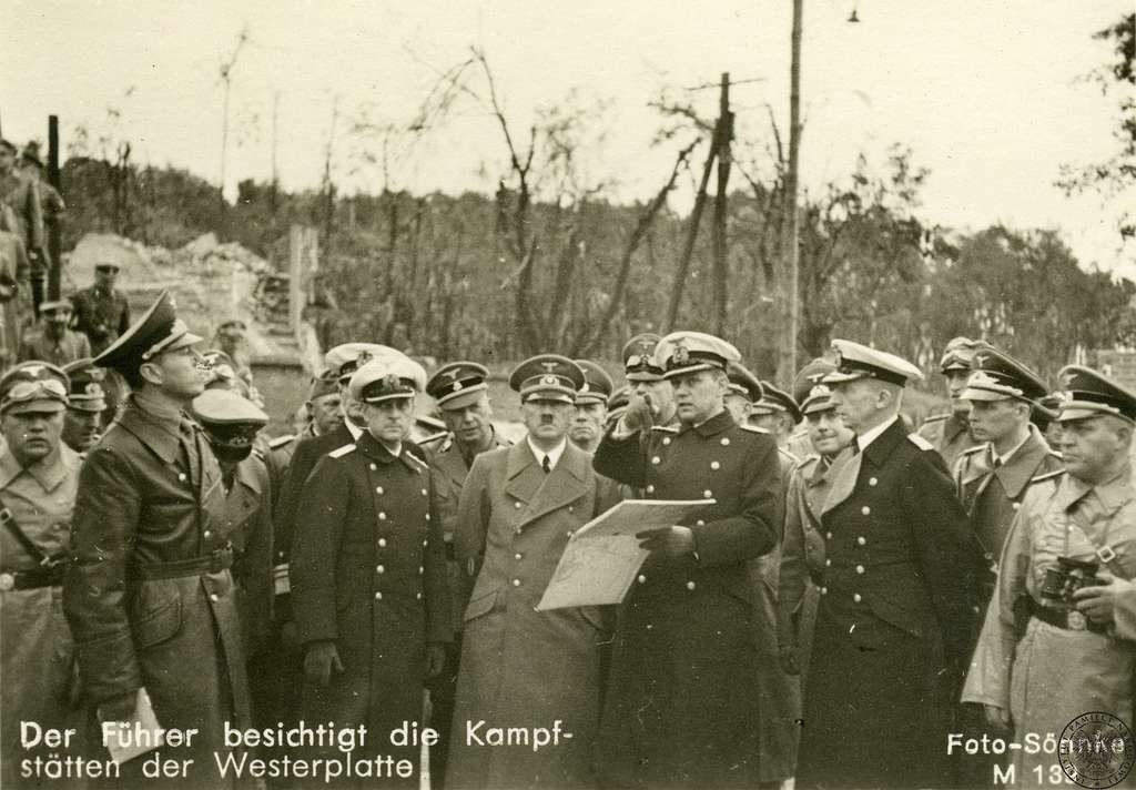 Adolf Hitler and Nazi officers inspecting the ruins of Westerplatte after the invasion of Poland during World War 2, marking the start of the Blitzkrieg strategy.